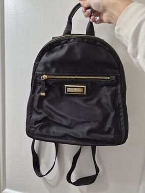 Calvin Klein Black Mini Backpack with Gold Hardware